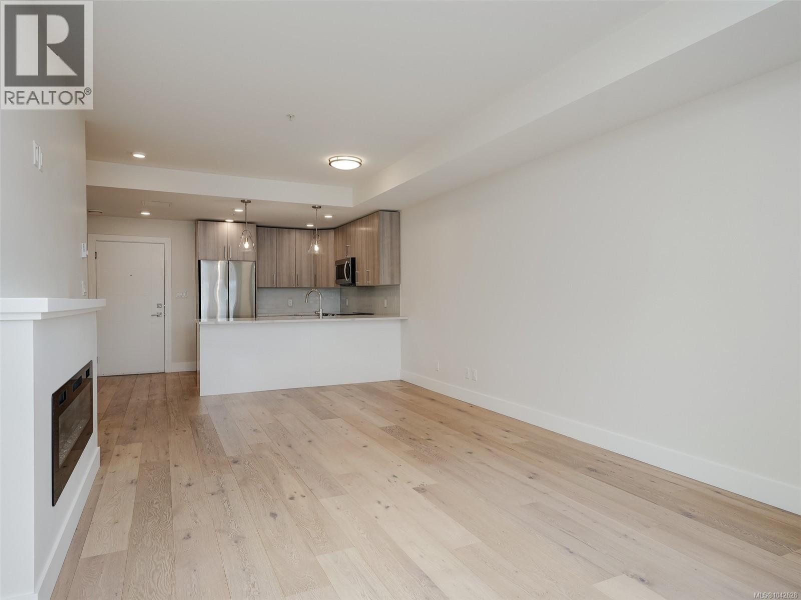 #203 7098 Wallace Dr - 10