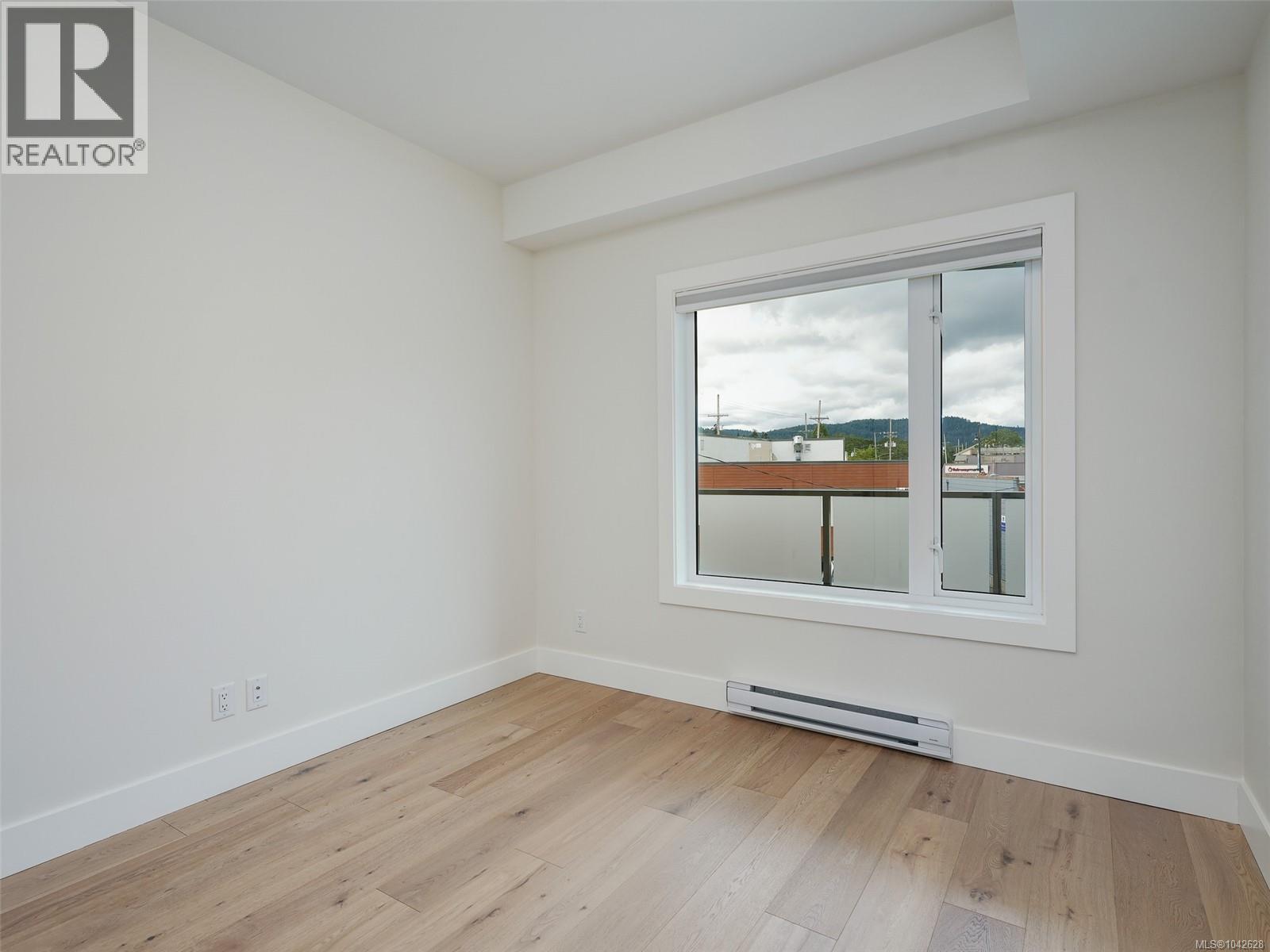 #203 7098 Wallace Dr - 13