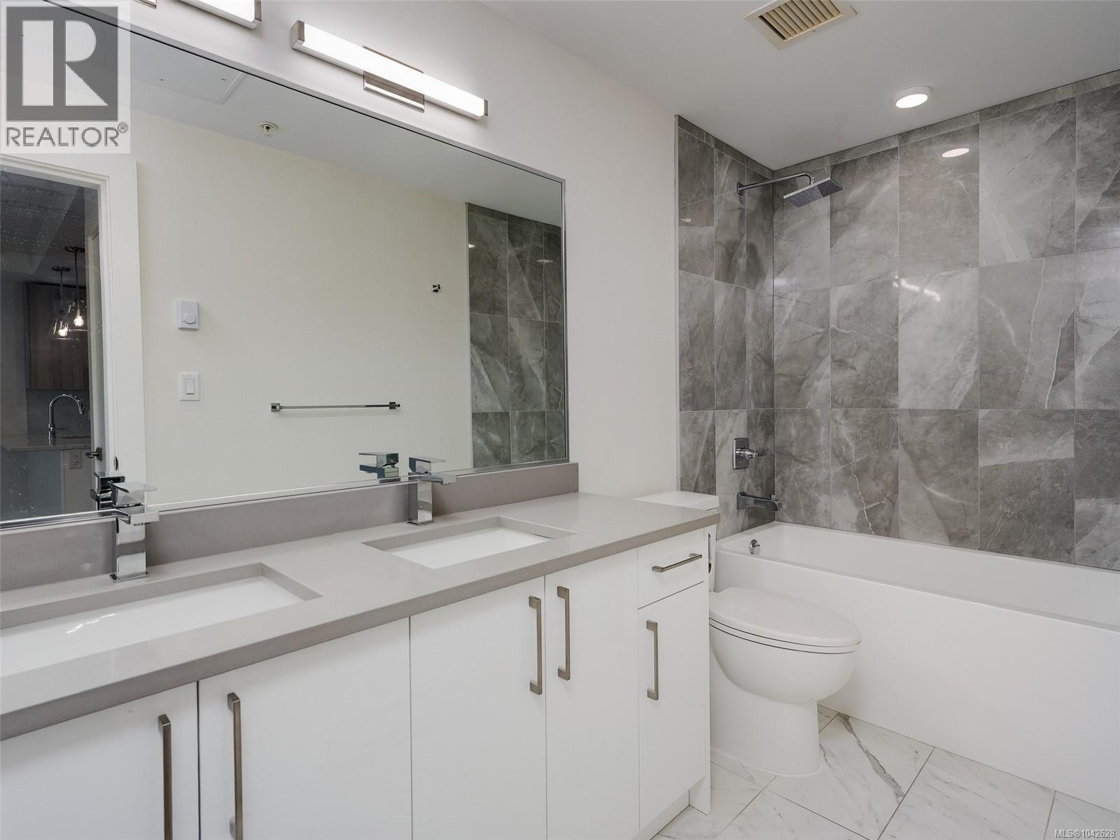 #203 7098 Wallace Dr - 16