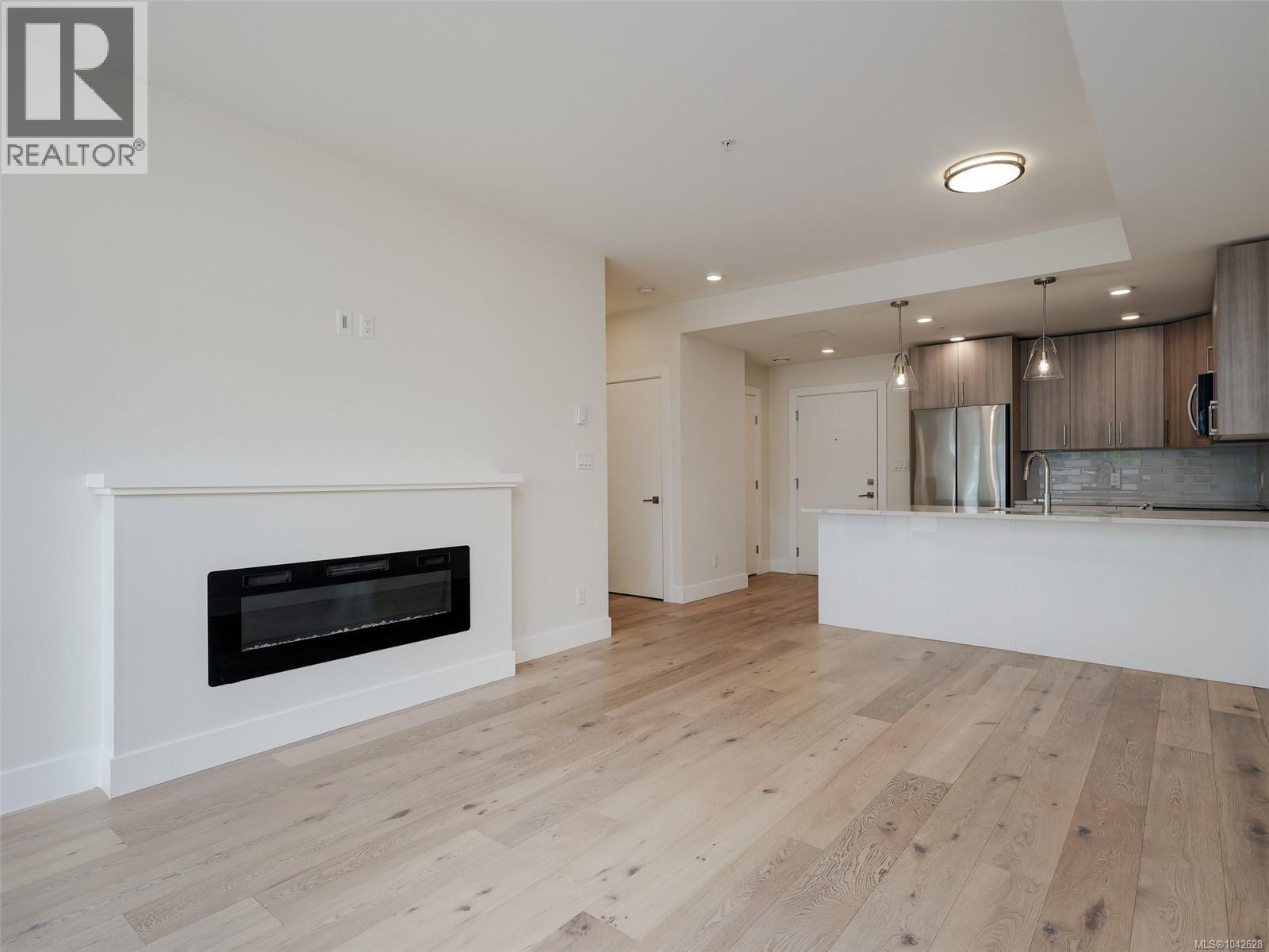 #203 7098 Wallace Dr - 5