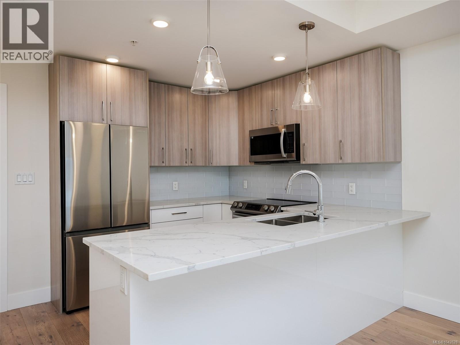 #203 7098 Wallace Dr - 8
