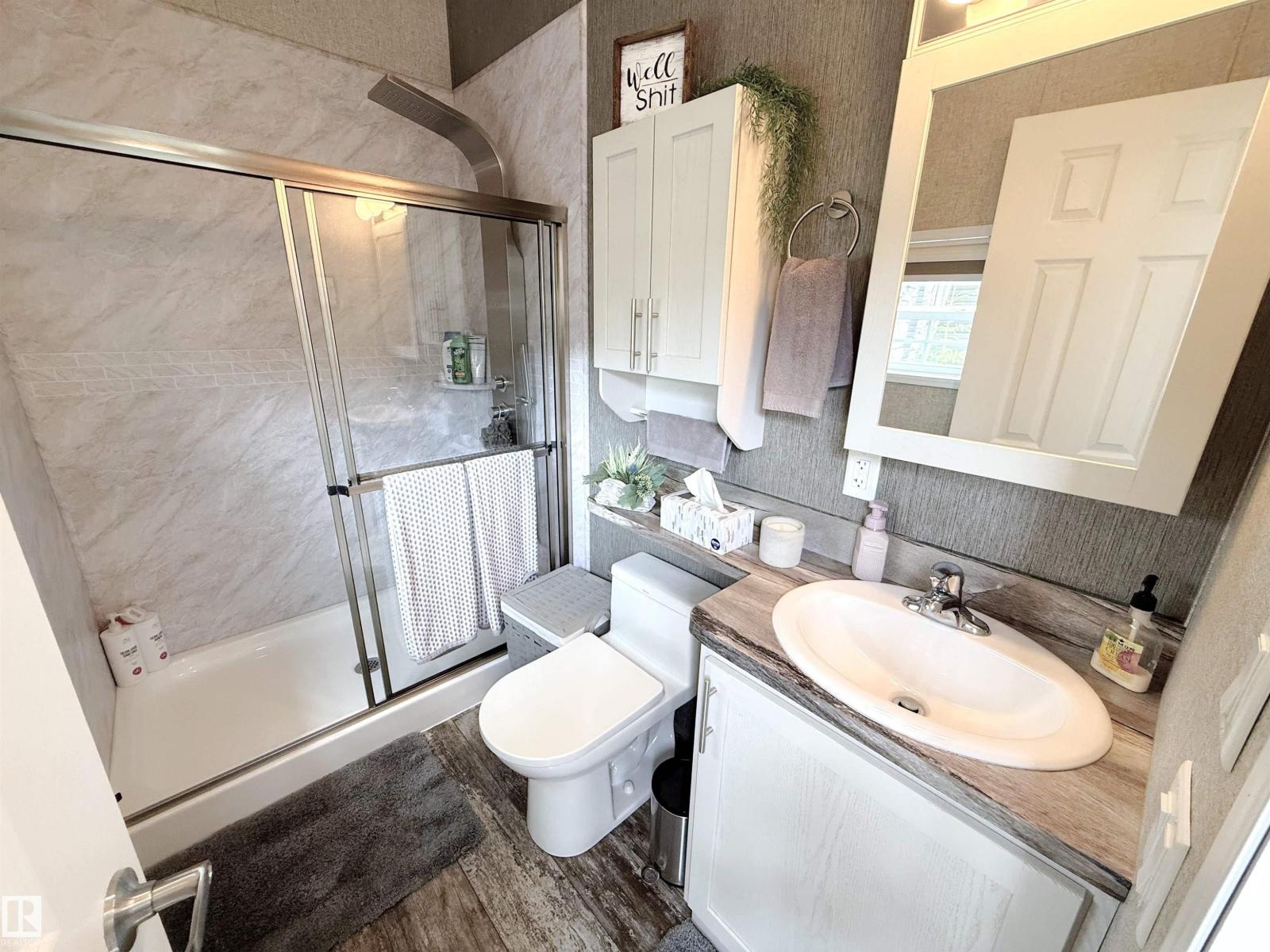 #64 53206 RGE ROAD 55 A - 21