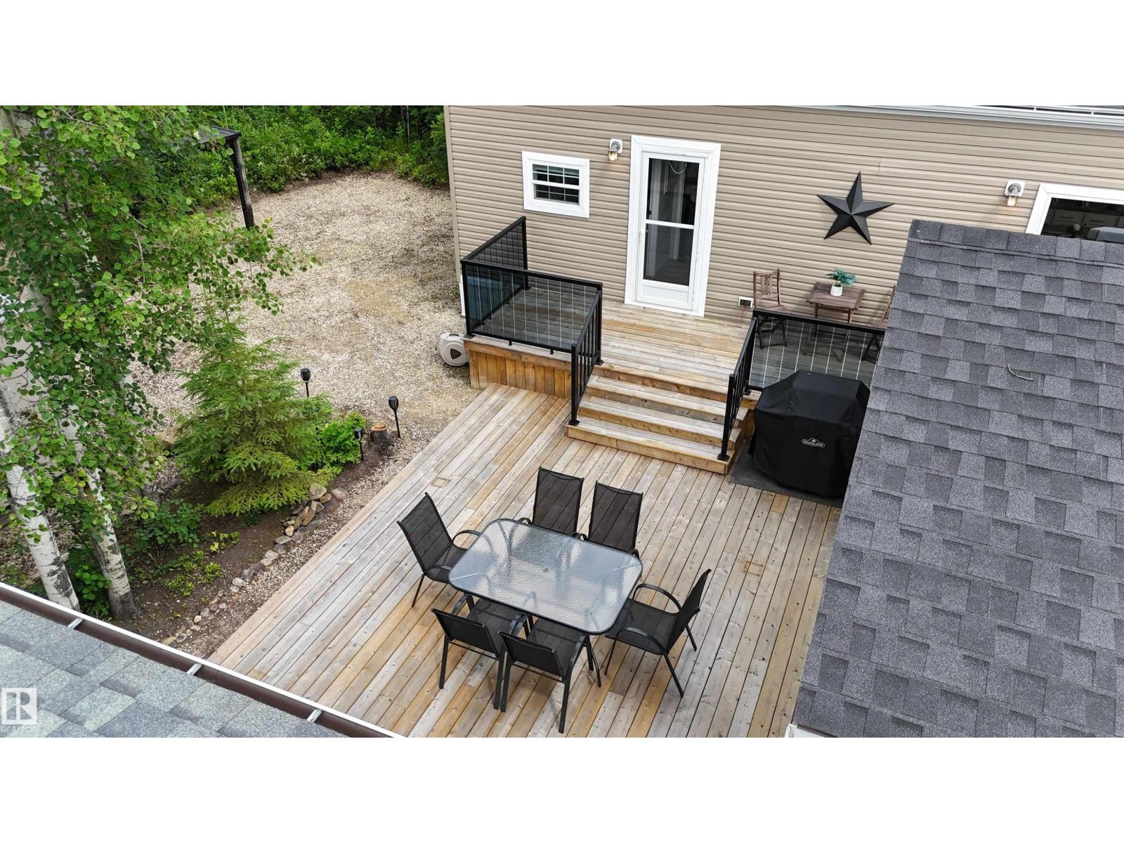 #64 53206 RGE ROAD 55 A - 23