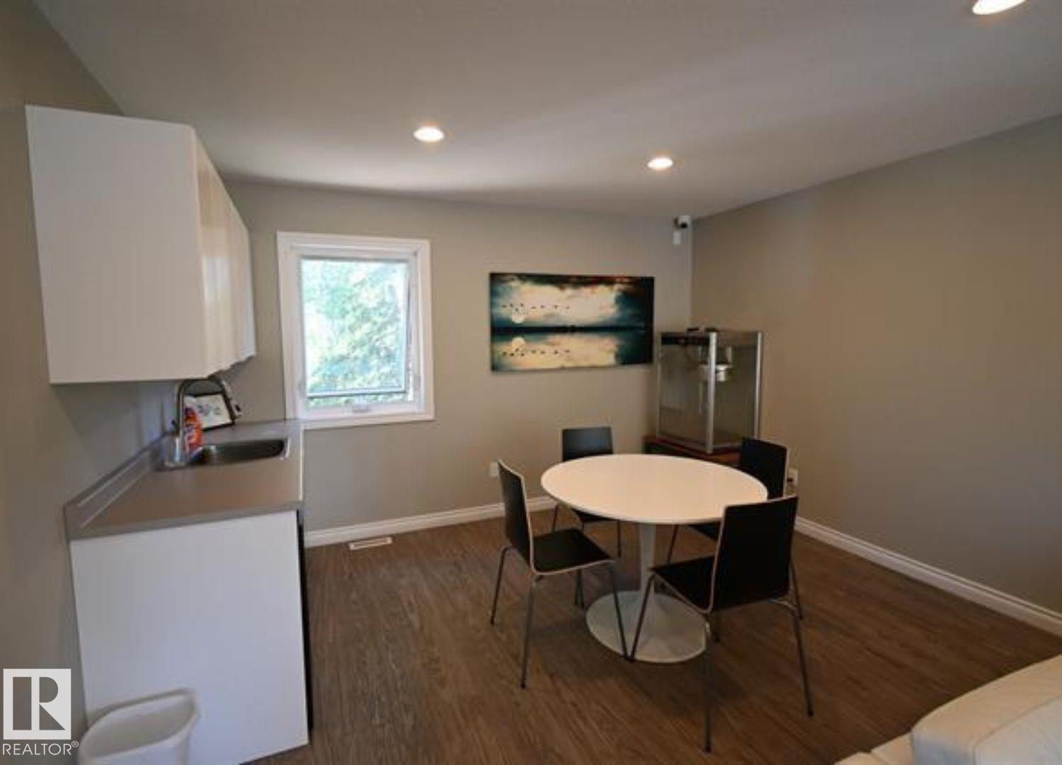 #64 53206 RGE ROAD 55 A - 57