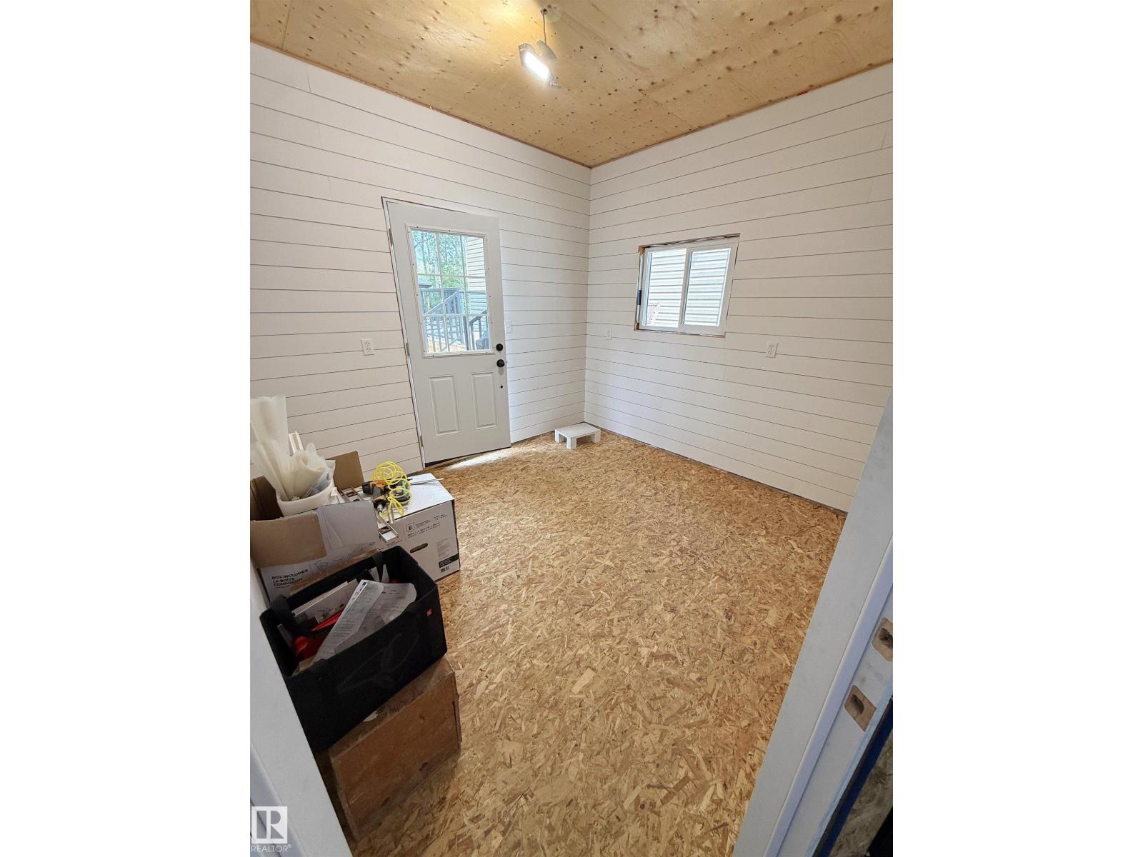 #64 53206 RGE ROAD 55 A - 27