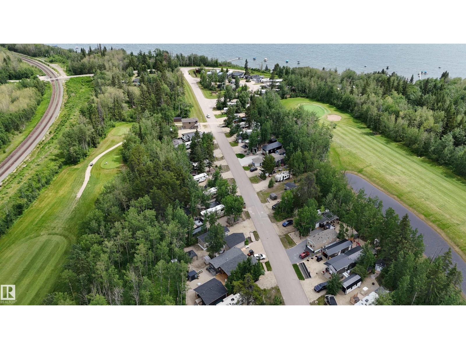 #64 53206 RGE ROAD 55 A - 46