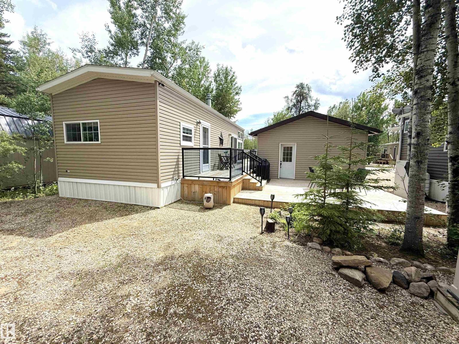 #64 53206 RGE ROAD 55 A - 42