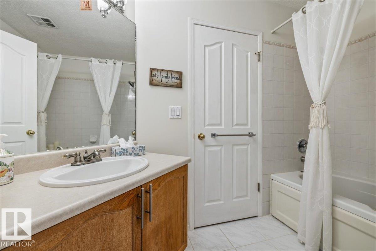 #427 15499 CASTLE DOWNS RD NW - 26