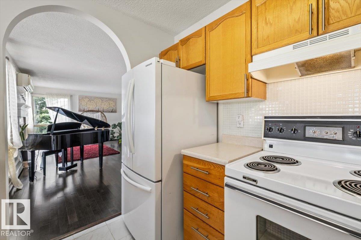 #427 15499 CASTLE DOWNS RD NW - 5