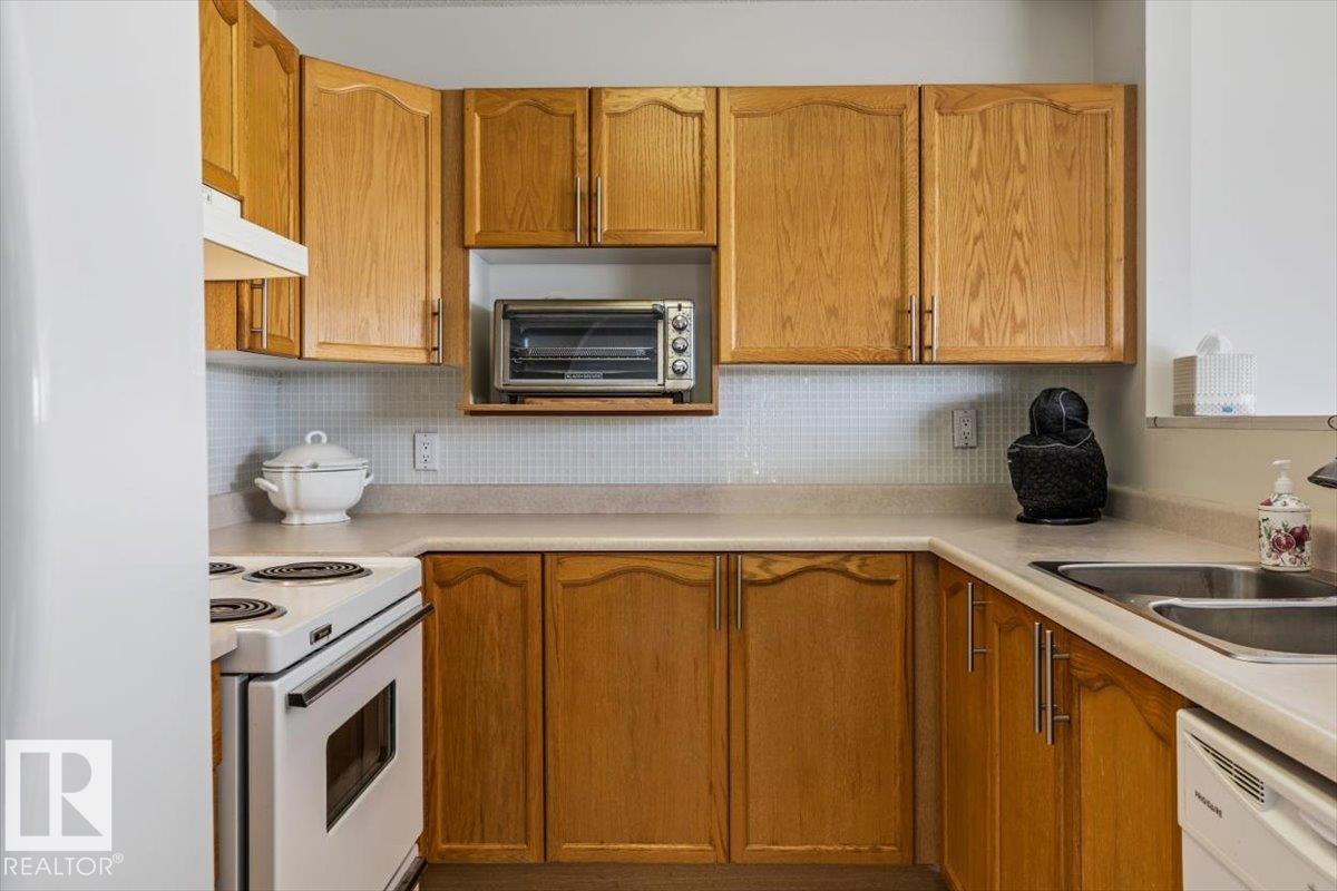 #427 15499 CASTLE DOWNS RD NW - 6