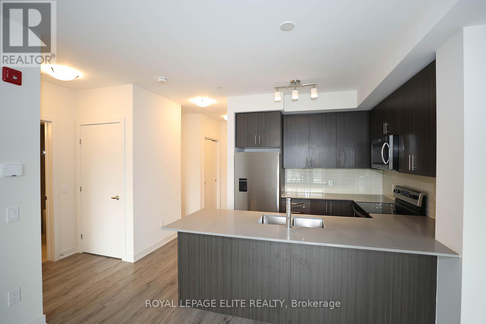 #303 340 PLAINS ROAD E - 12