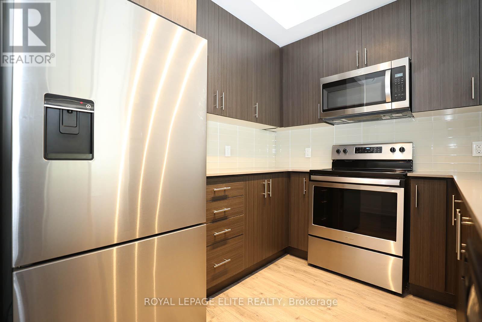 #303 340 PLAINS ROAD E - 22