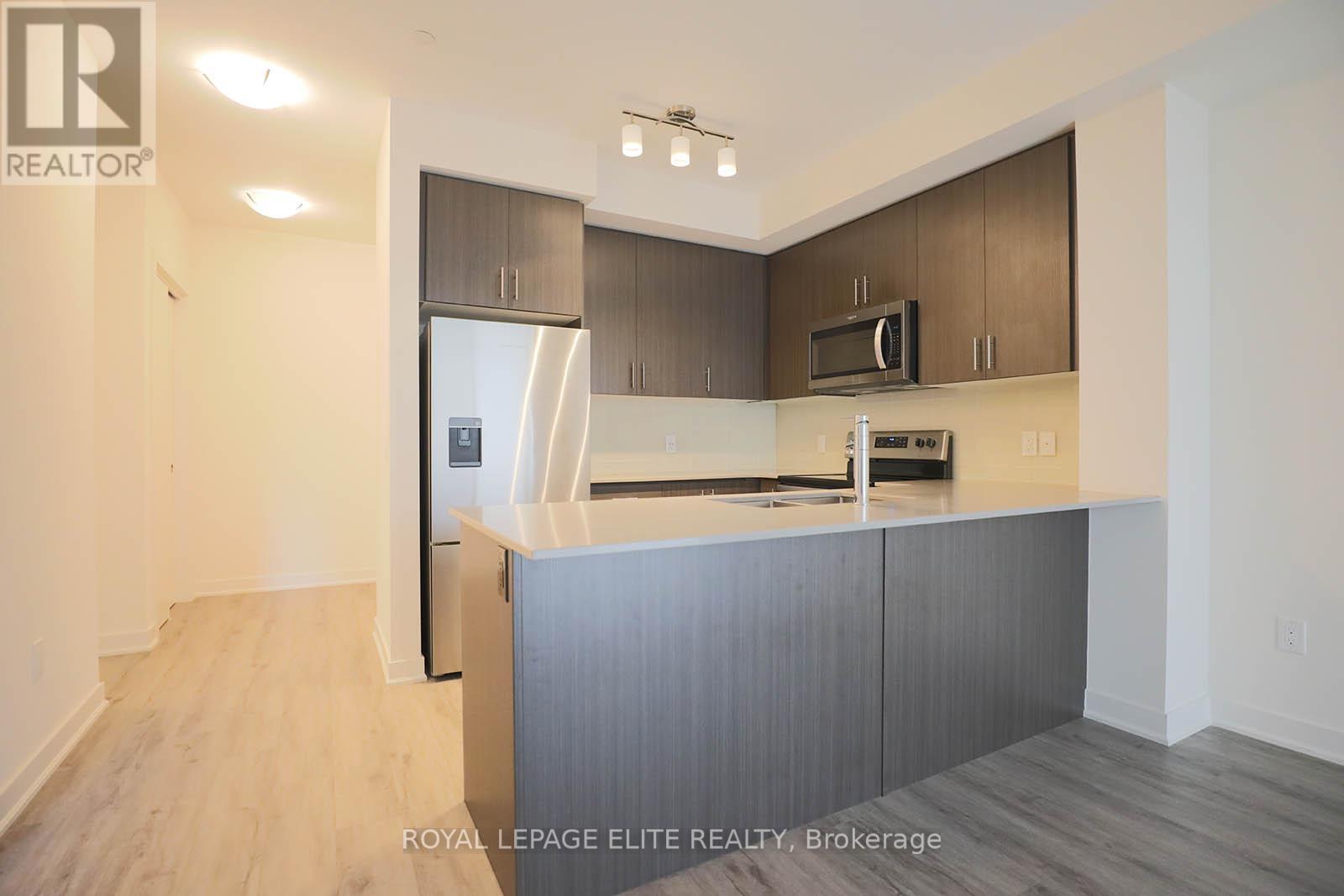 #303 340 PLAINS ROAD E - 6