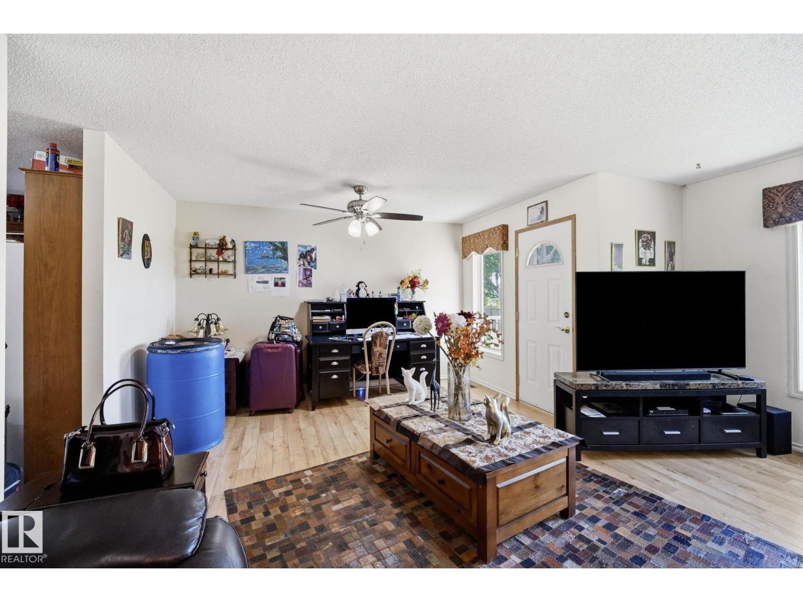 10840 25 AV NW - 11