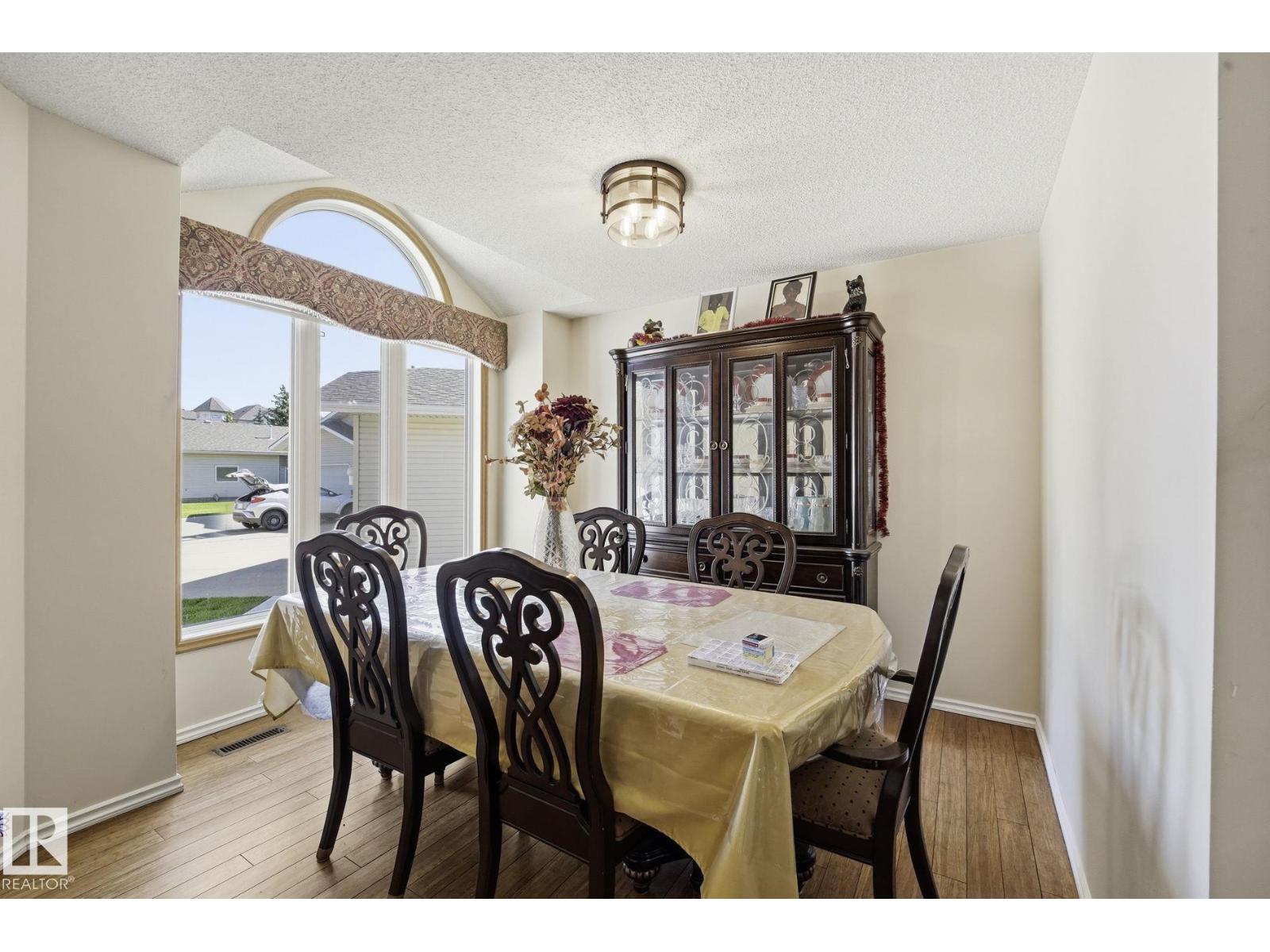 10840 25 AV NW - 12