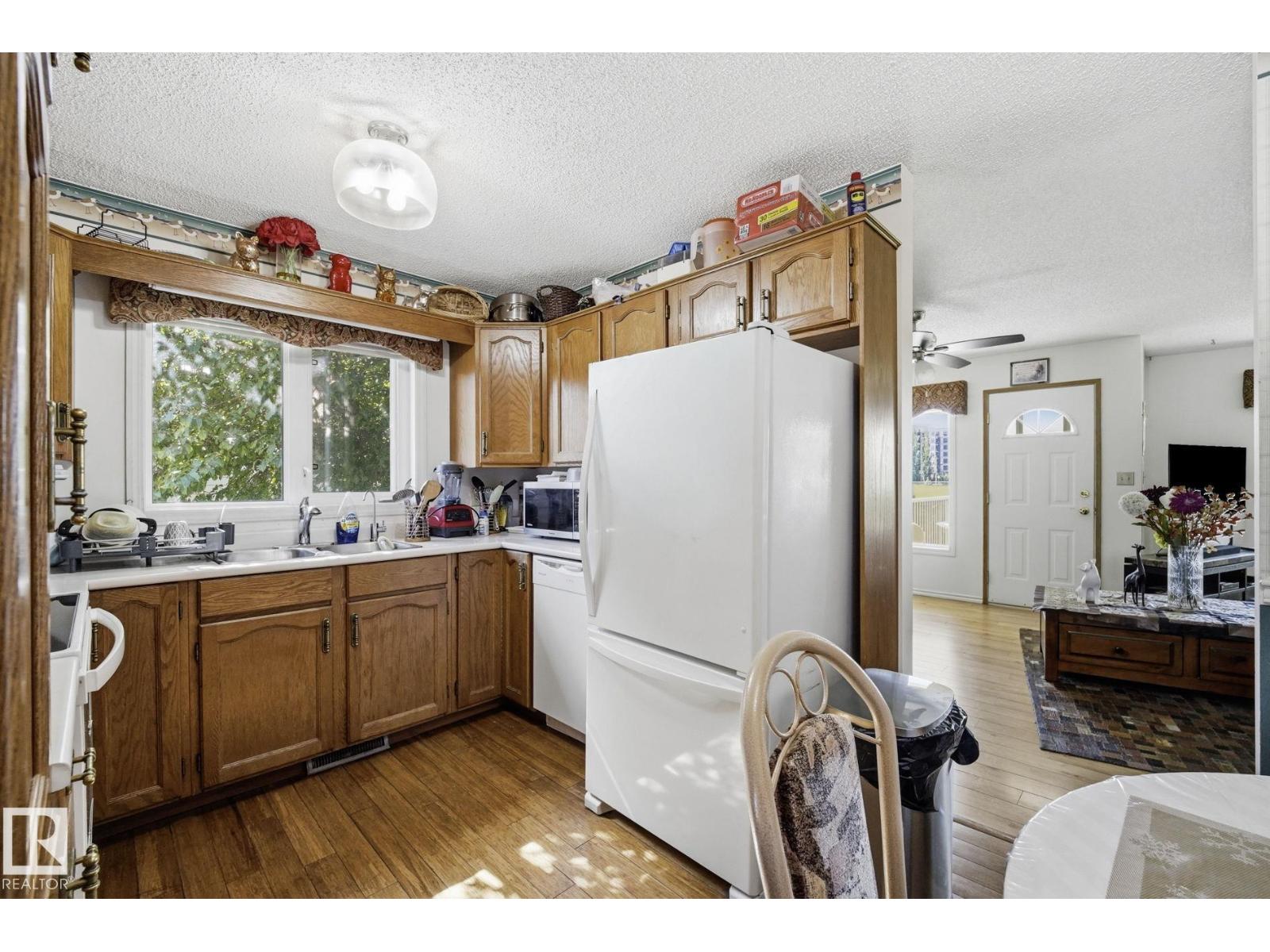 10840 25 AV NW - 14