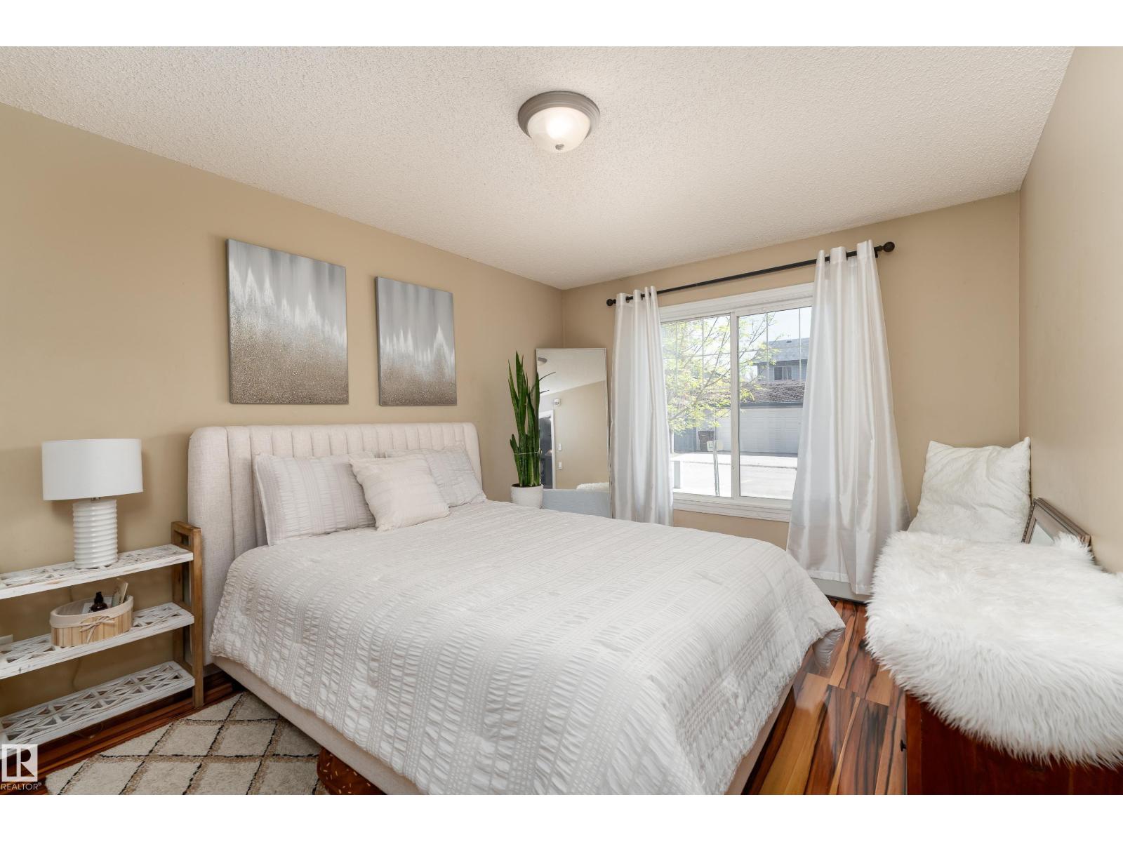 #103 13710 150 AV NW - 12