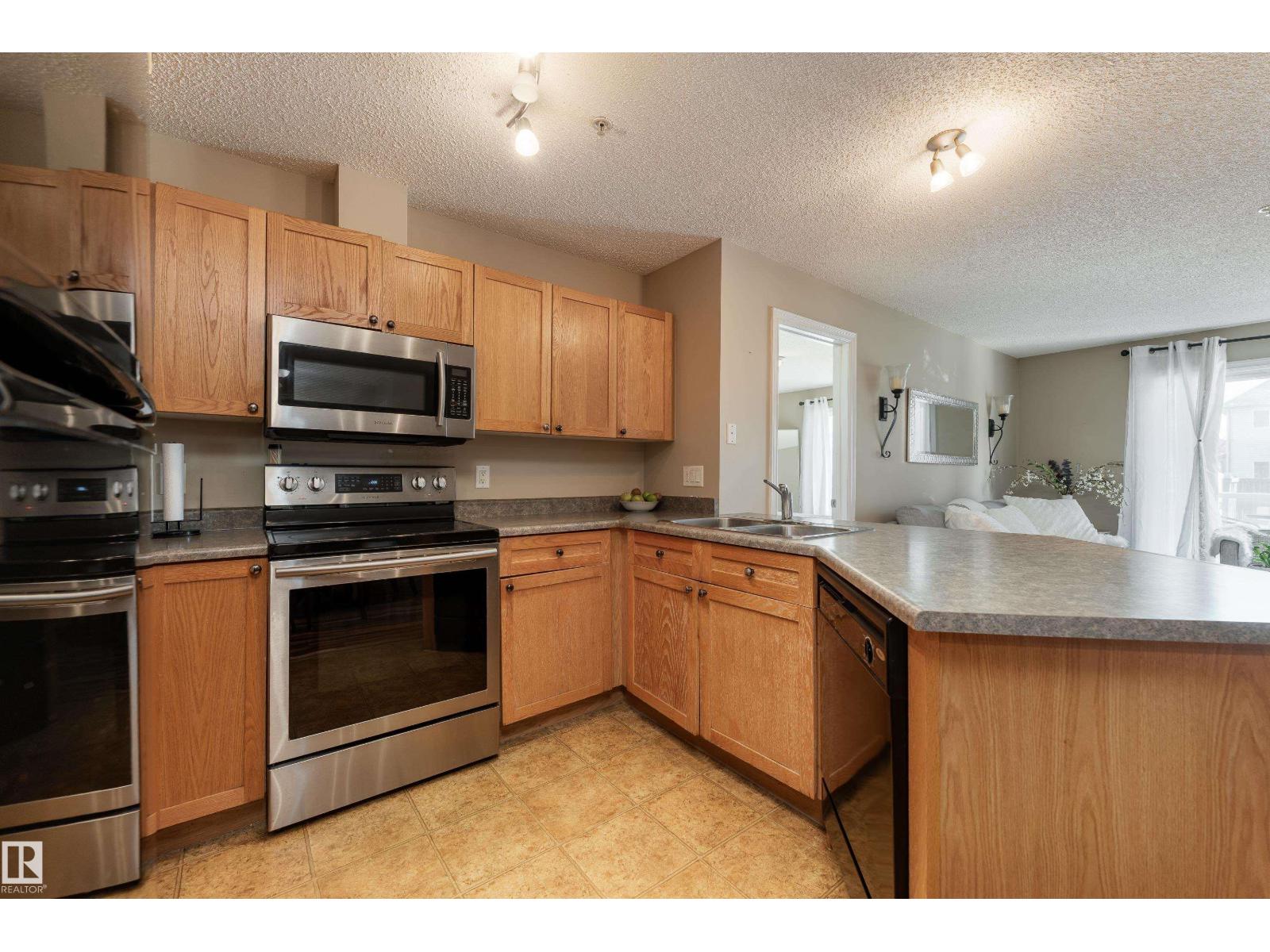#103 13710 150 AV NW - 6