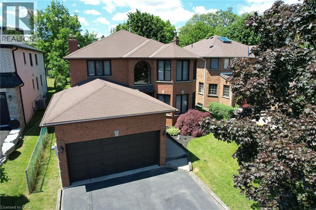 Full brick home, 4 parking space driveway, double car garage.