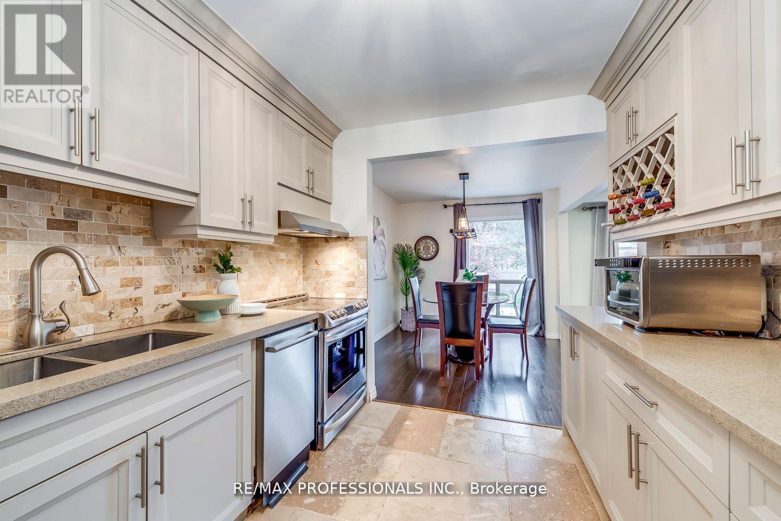 #51 4345 BLOOR STREET W - 12
