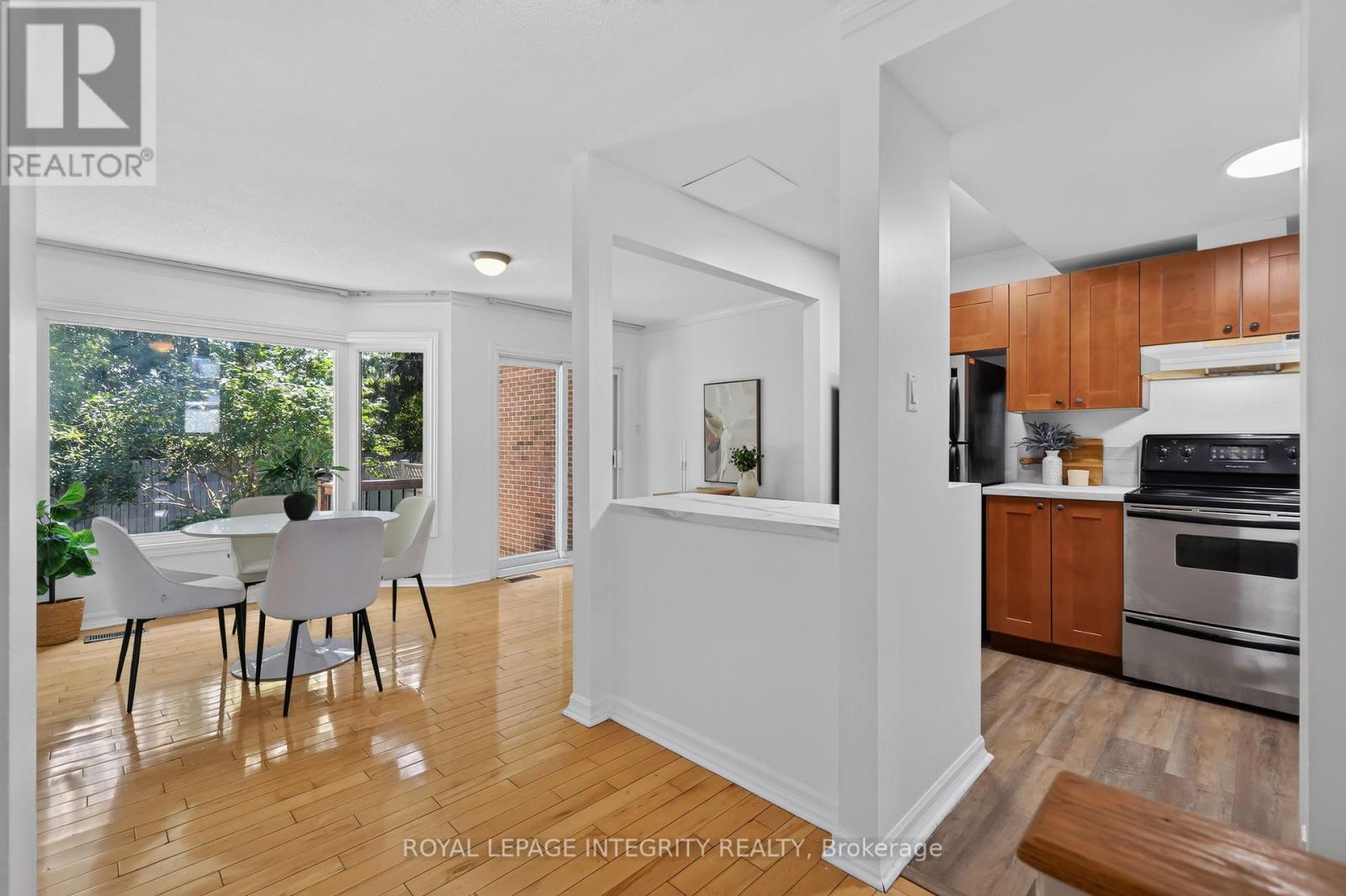 Open concept dining room overlooking the kitchen.