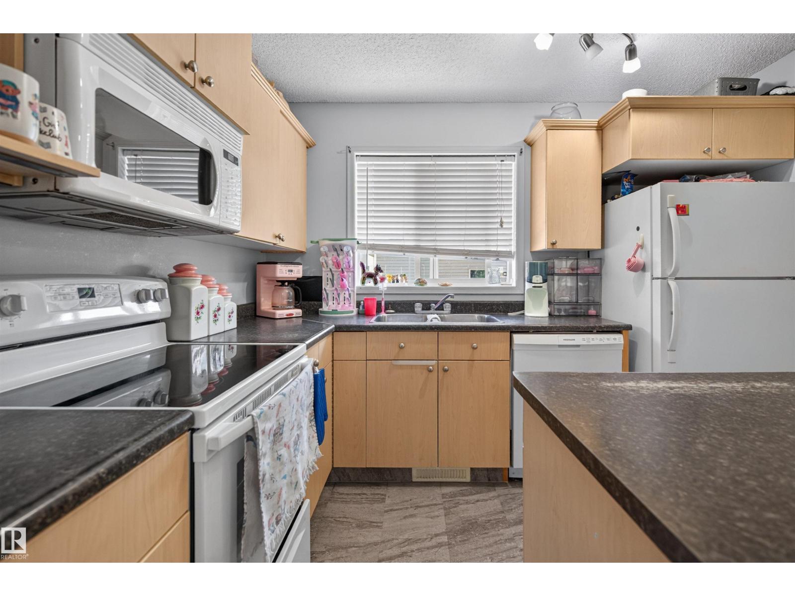 9110 SCOTT CR NW - 9