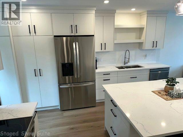 #37 981 12 Street SE - 52