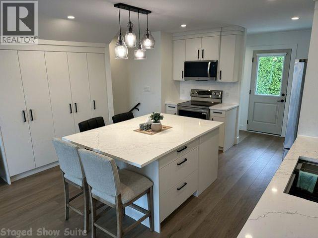 #37 981 12 Street SE - 55