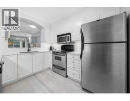 215 3600 Windcrest Drive, North Vancouver, BC V7G2S5 Photo 11