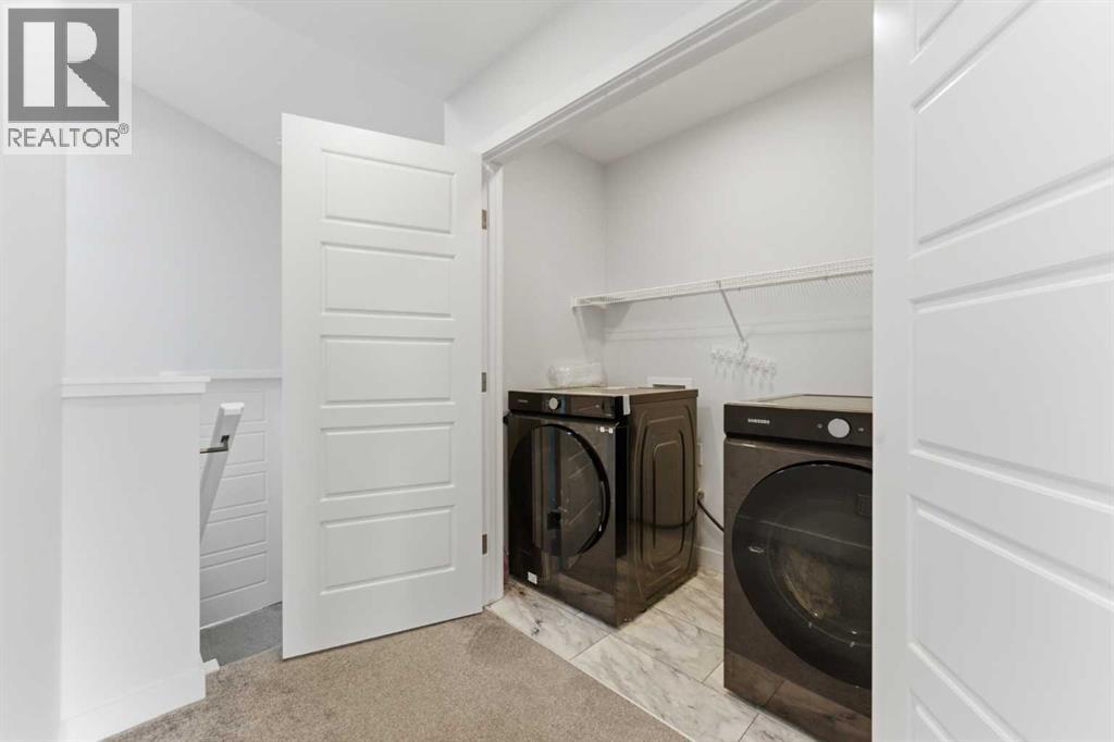 The laundry is conveniently located on the upper floor..