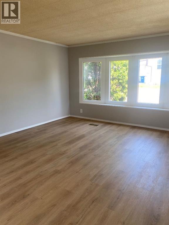 818, 6834 59 Avenue - 7