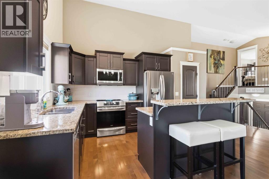 Kitchen complete with eat up bar