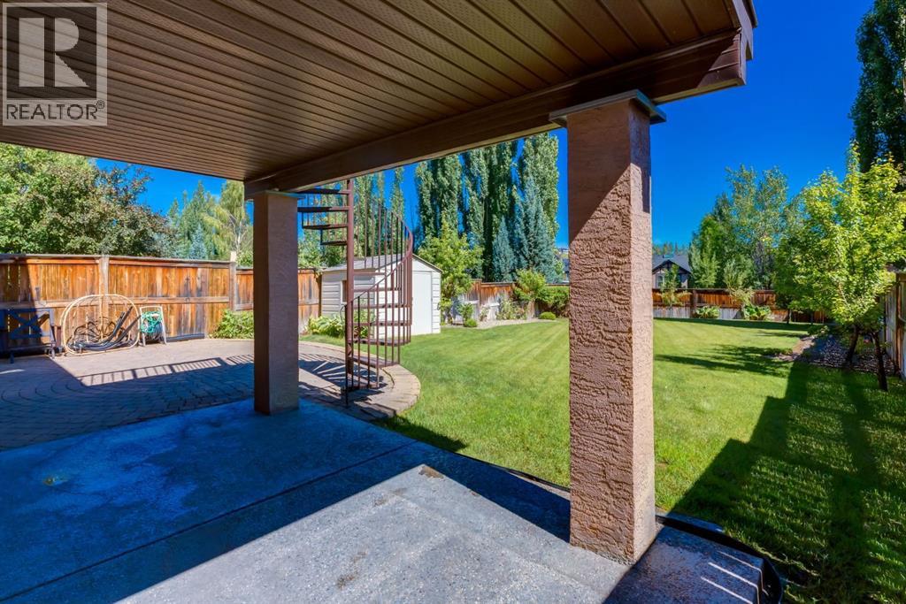 Backyard lower patio and stairs to main floor deck