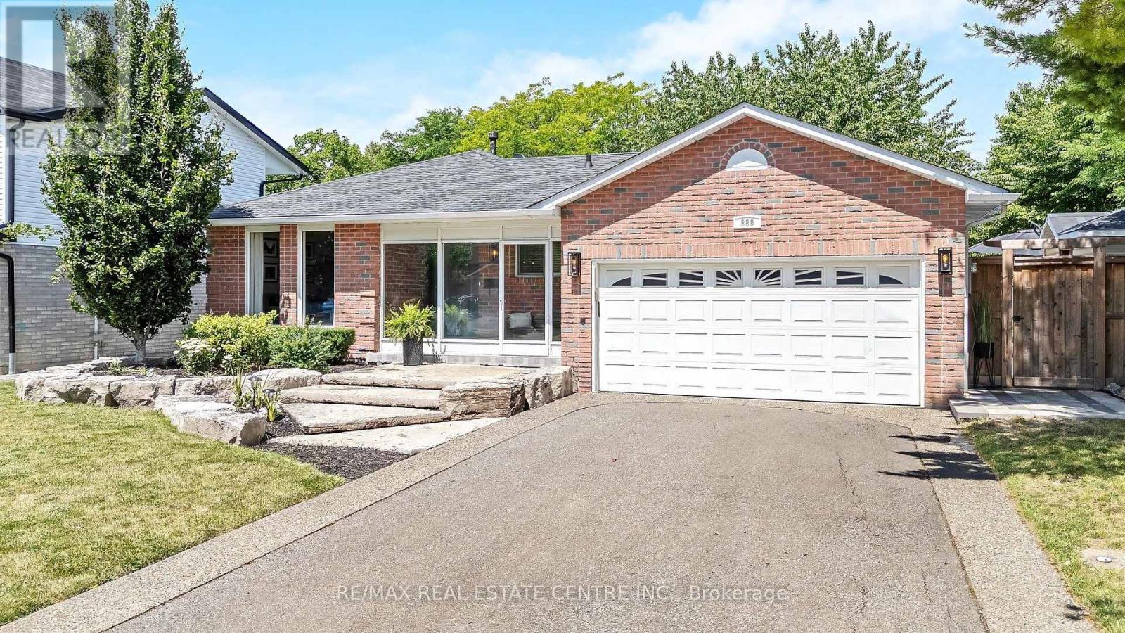 All brick, 4 level backsplit with double garage
