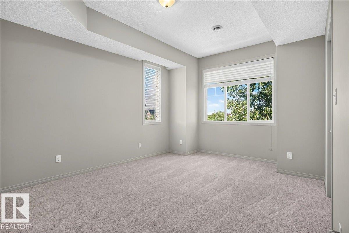 #20 4821 TERWILLEGAR CM NW - 32