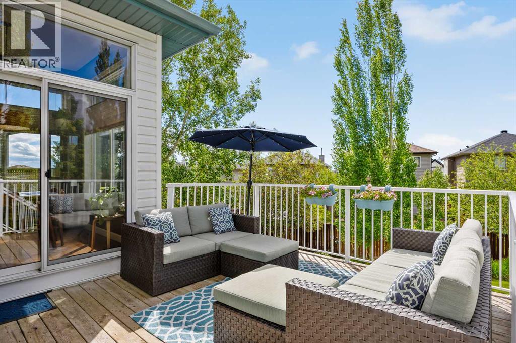 Surrounded by mature trees with the neighbourhood tucked quietly beyond, this deck feels more like a treehouse escape than a suburban backyard