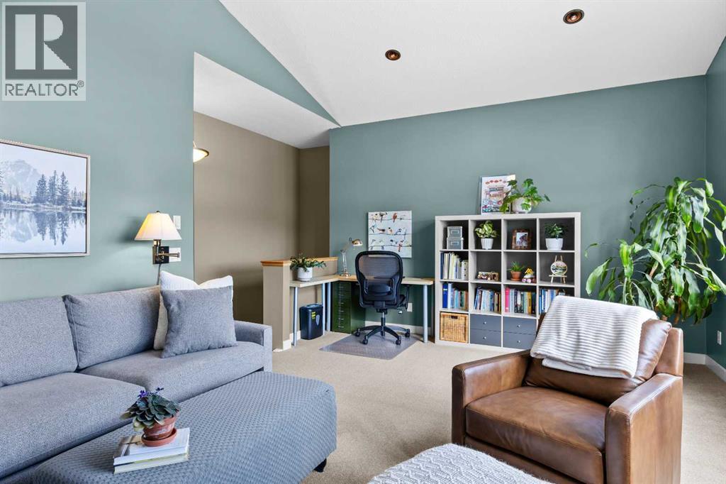 Tucked at the top of the stairs, a built-in workspace makes room for homework sessions or a work-from-home setup without giving up a bedroom