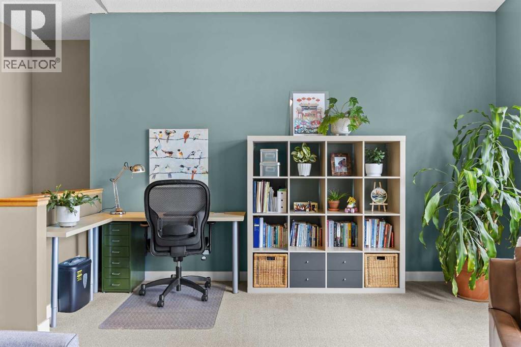 A dedicated desk nook keeps school projects and busy schedules organized, right in the middle of the action
