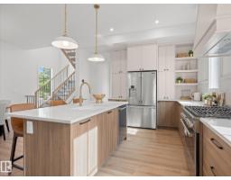 Laundry room - 6303 109b Av Nw, Edmonton, AB T6A1S7 Photo 9