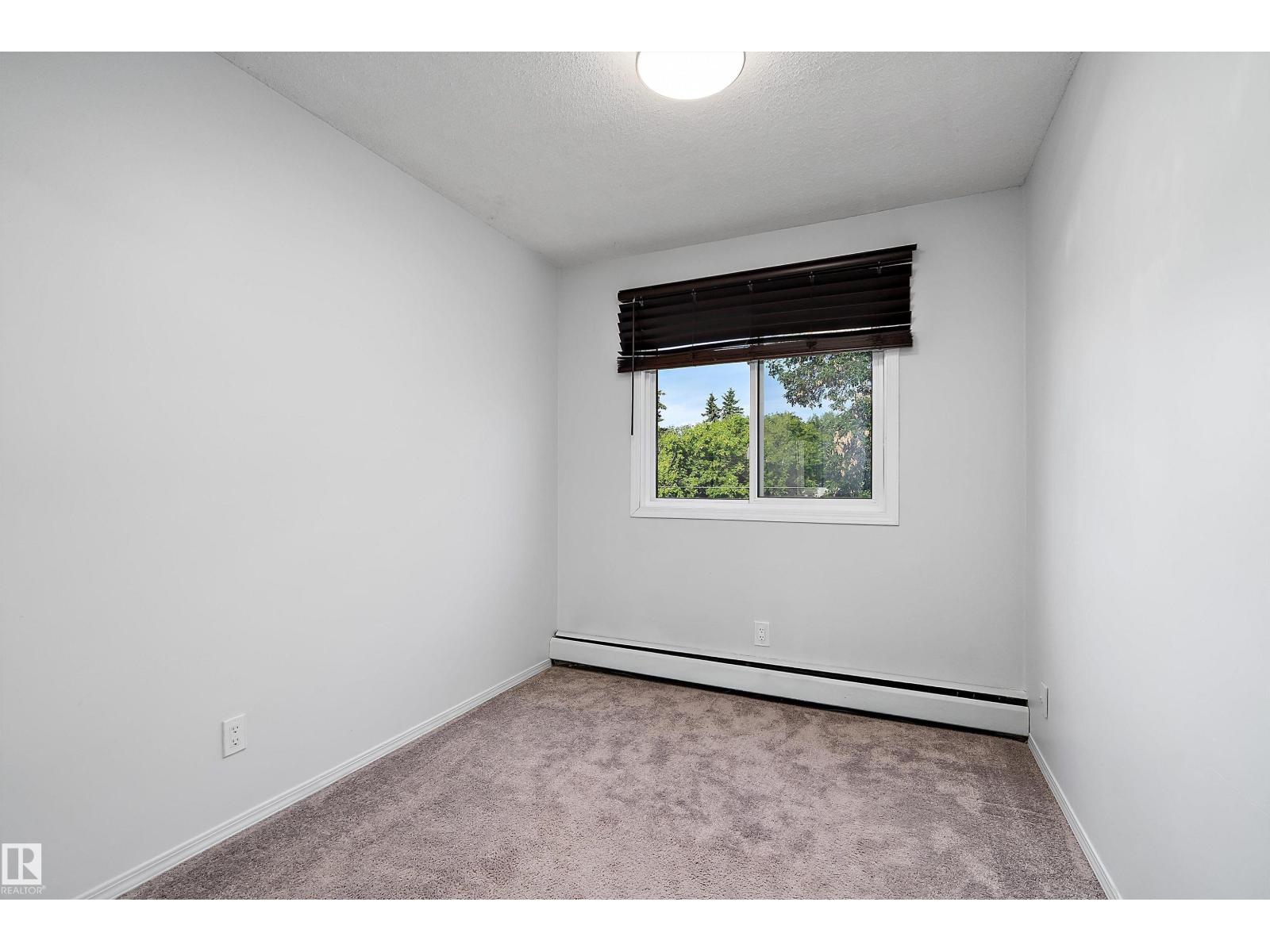 #304 10720 127 ST NW - 18