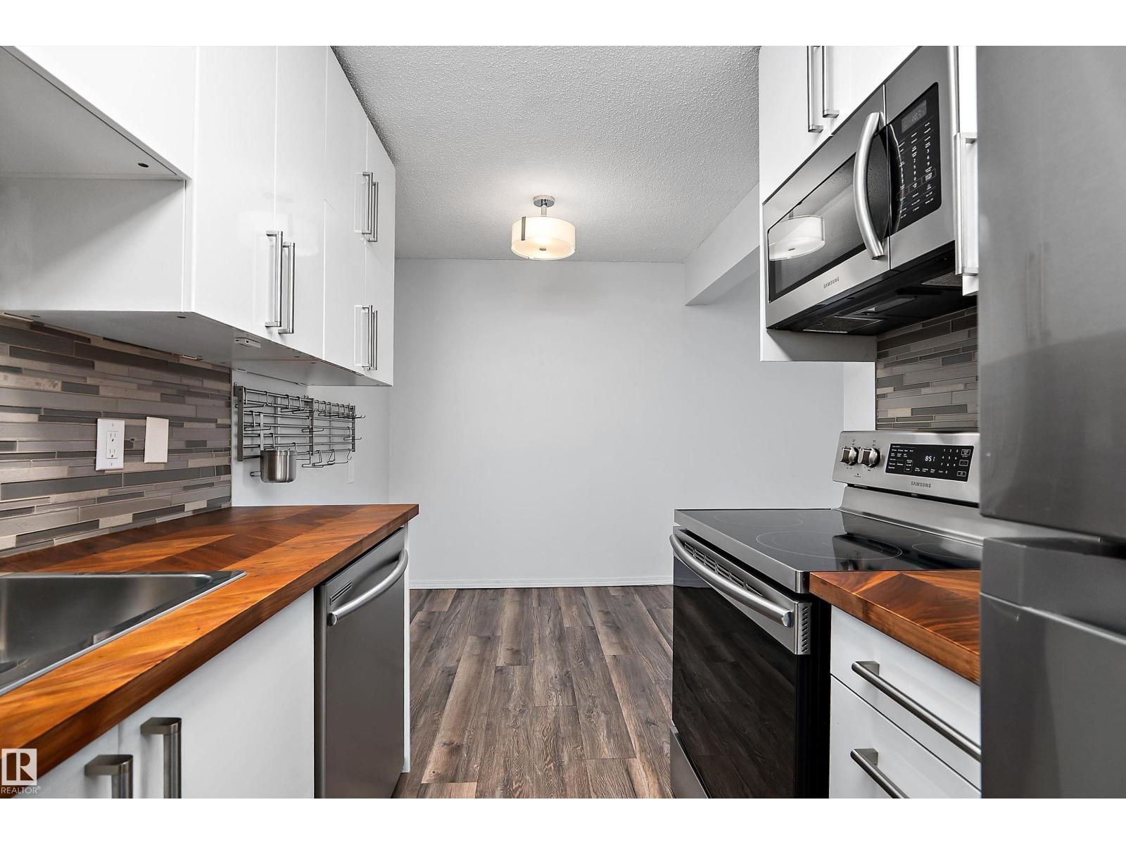 #304 10720 127 ST NW - 13