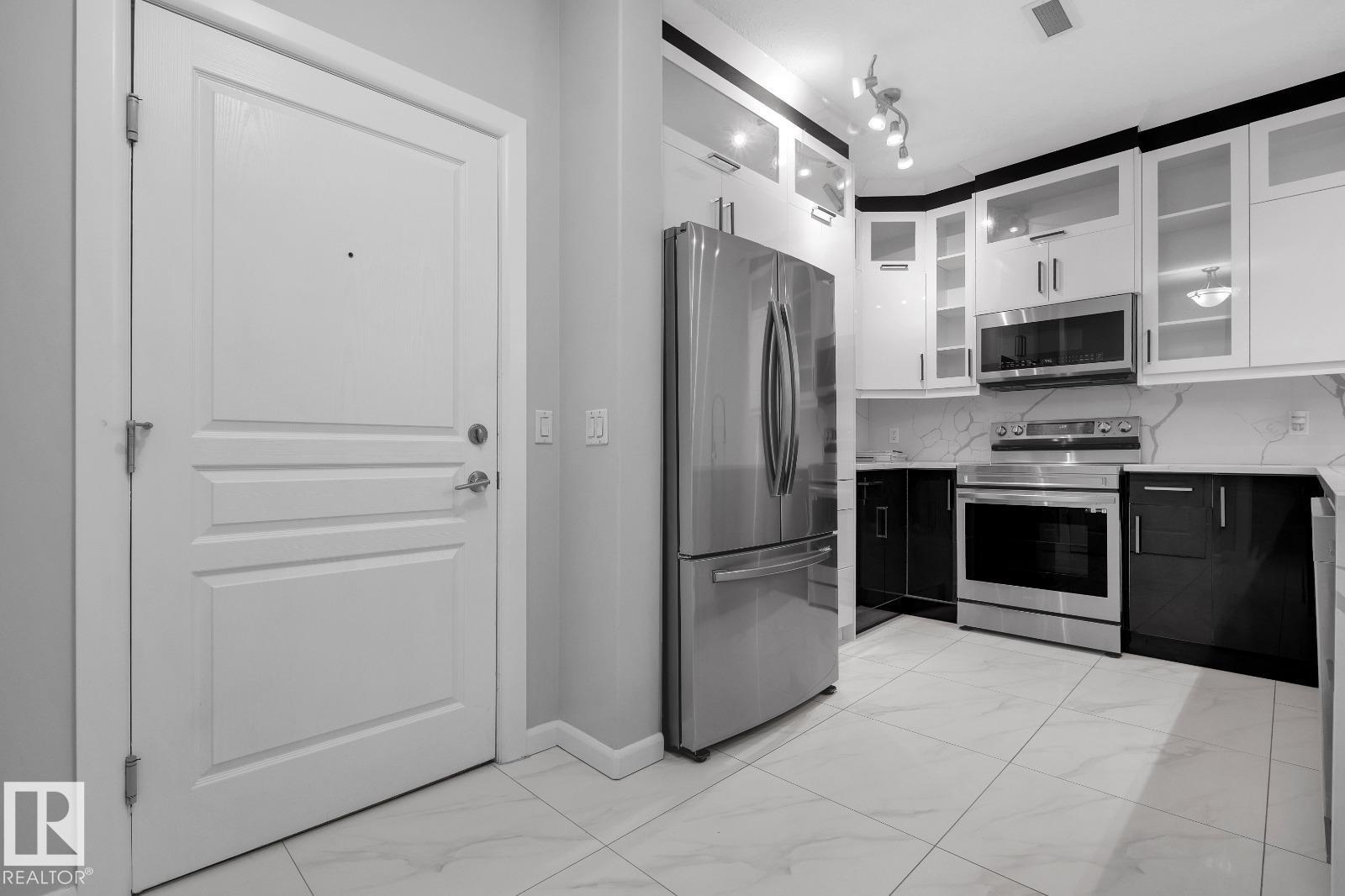 #105 160 MAGRATH RD NW - 19