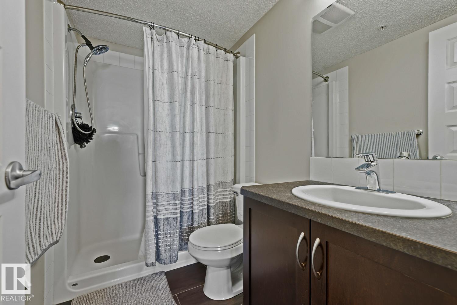 #317 400 SILVER BERRY RD NW - 24