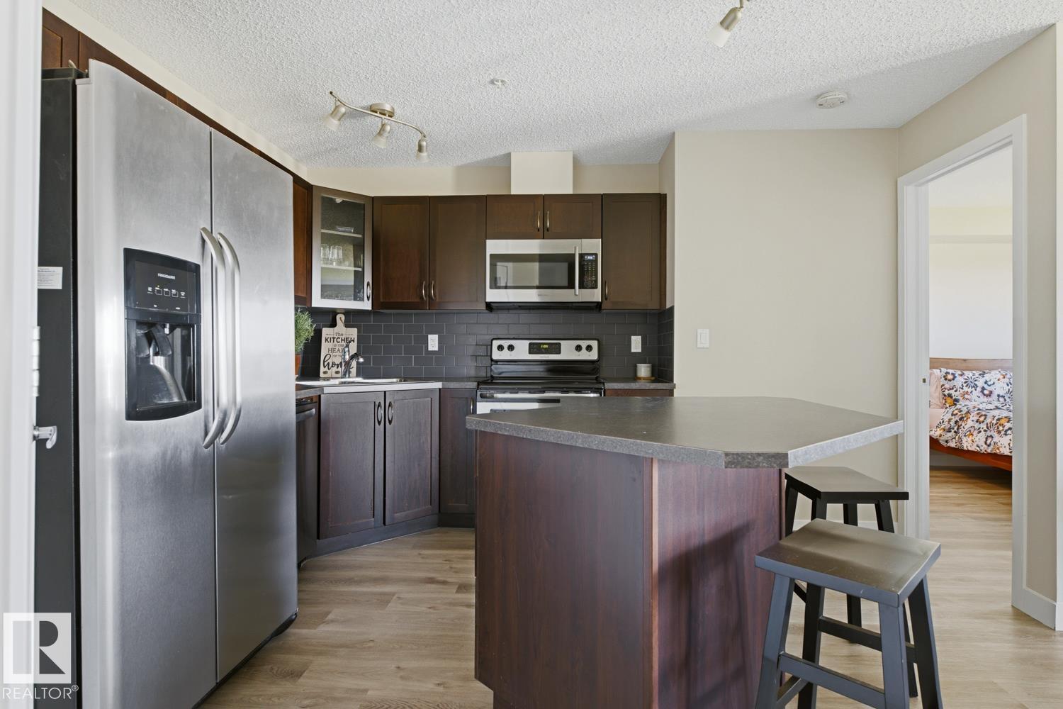 #317 400 SILVER BERRY RD NW - 7