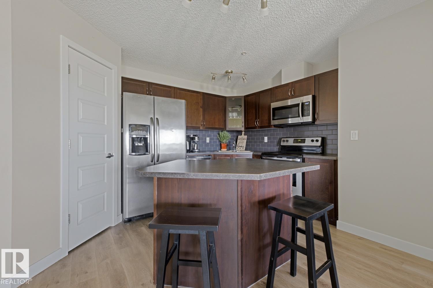 #317 400 SILVER BERRY RD NW — photo 8
