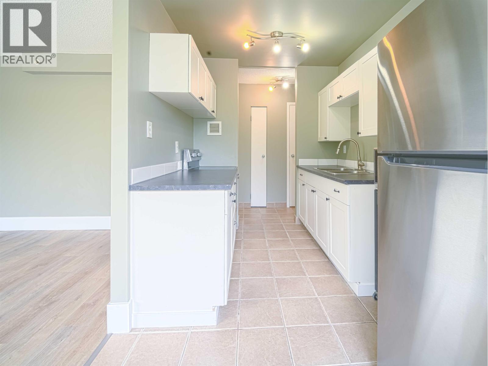 #406 1501 QUEENSWAY STREET - 5