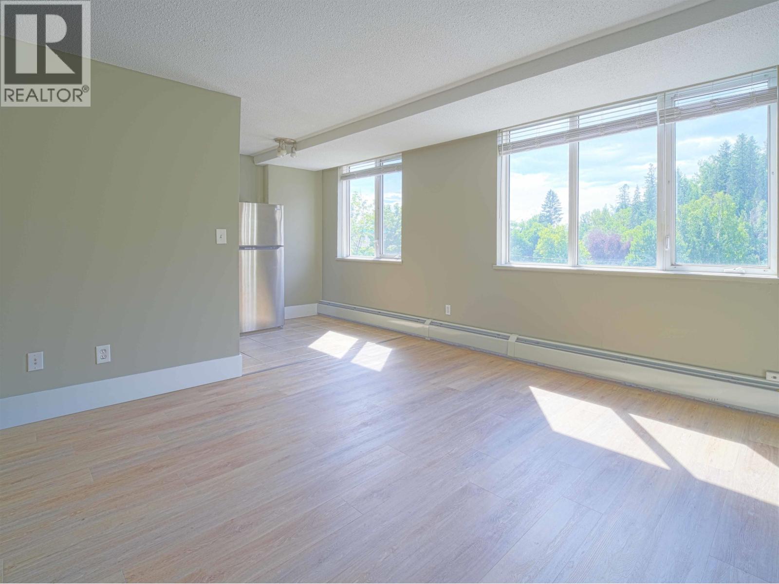 #406 1501 QUEENSWAY STREET - 10