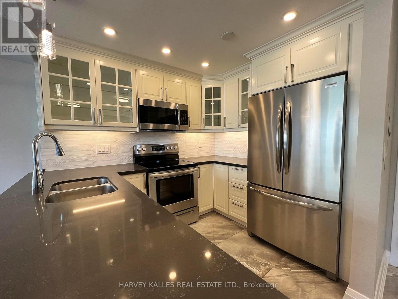 #410 555 WILSON HEIGHTS BOULEVARD - 3