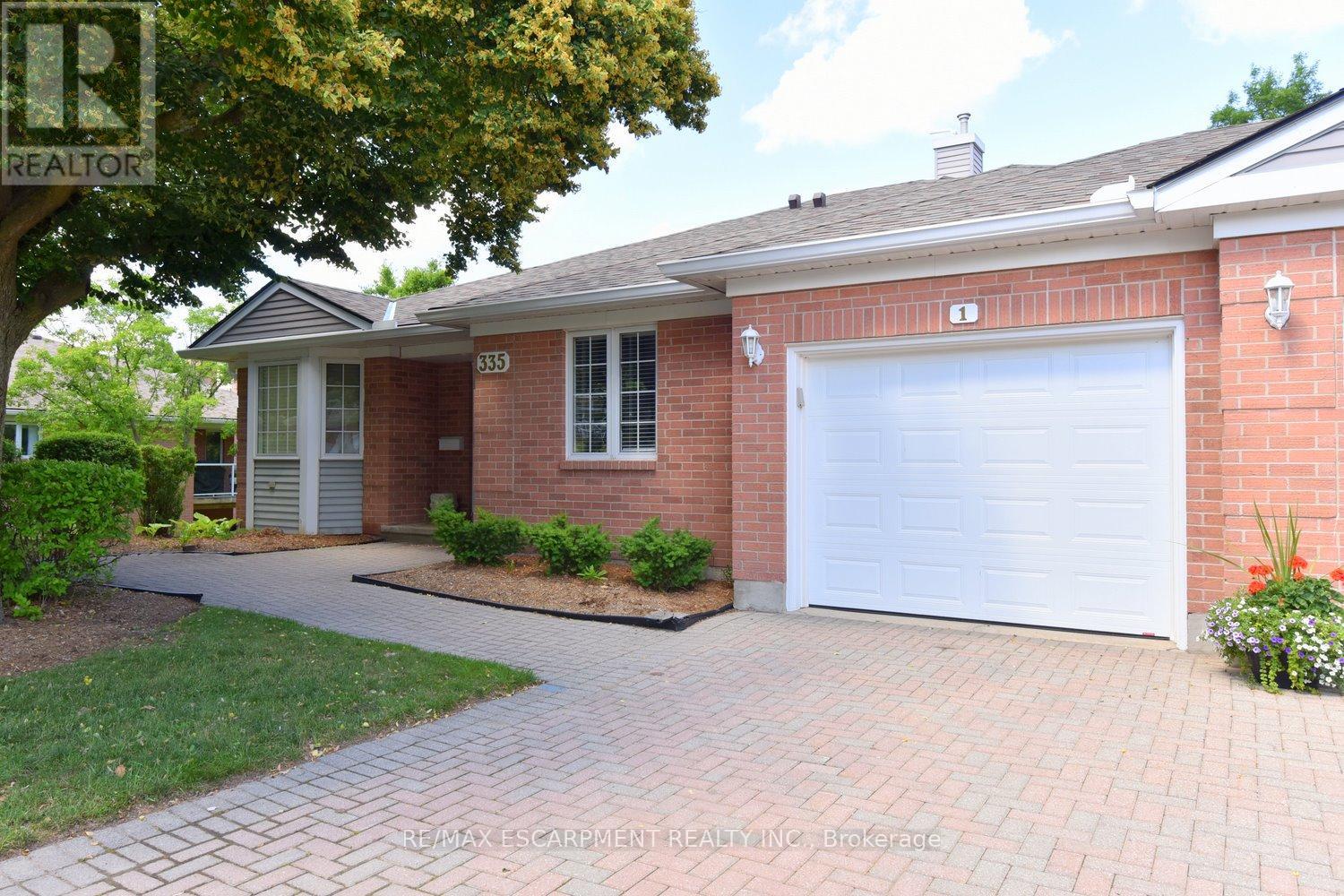#1 335 GEORGE STREET N - 1