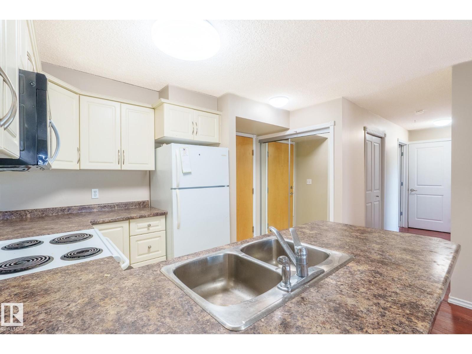 #422 17404 64 Av NW photo 5 — MLS® E4488113